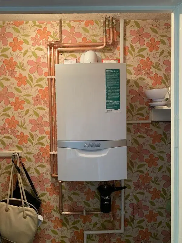 Vaillant boiler installation with exposed copper pipework and MagnaClean filter