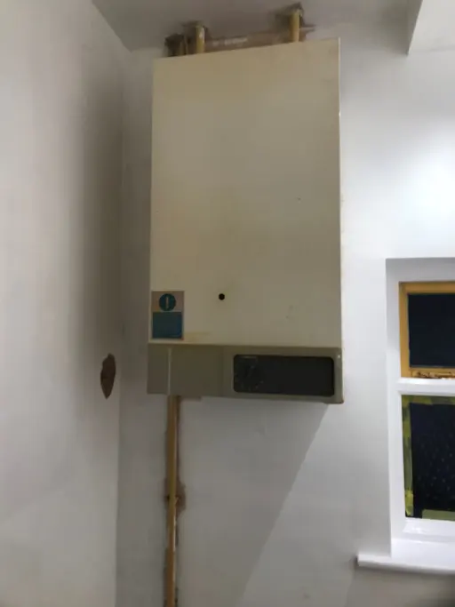 New Vaillant boiler fitted in airing cupboard with neat pipework