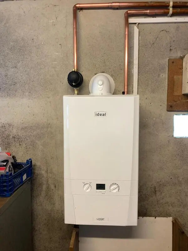 Ideal Logic combi boiler fitted in garage with copper pipework