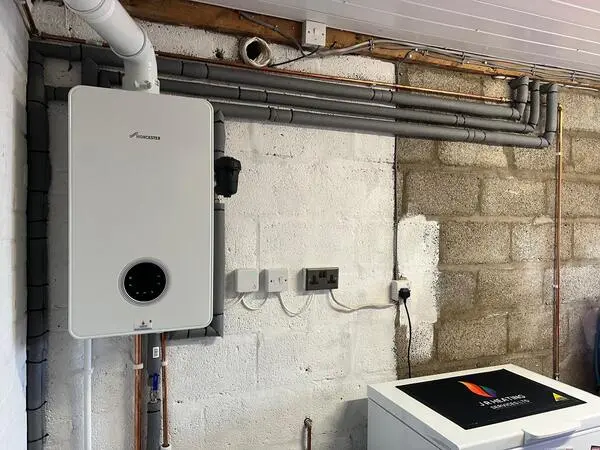 Worcester Bosch boiler installed in garage with lagging and smart controls