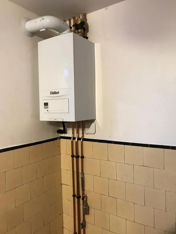 Vaillant boiler installation in tiled utility room