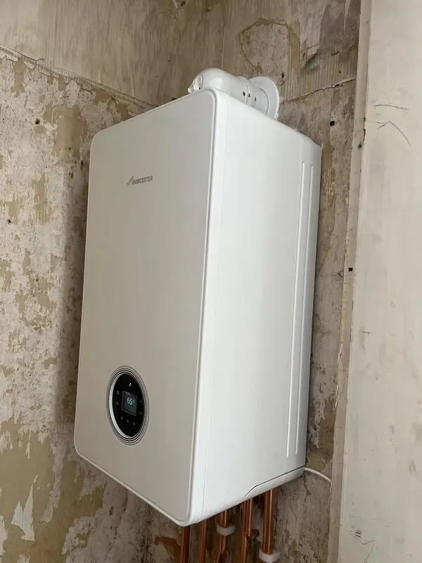 Worcester Bosch Greenstar boiler installed with condensate and pipework