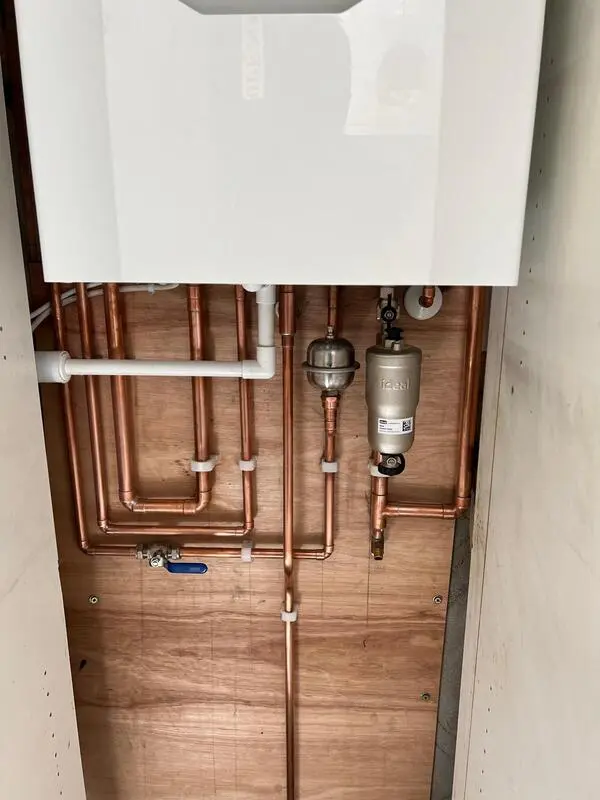 Ideal boiler pipework detail showing filter and isolation valves