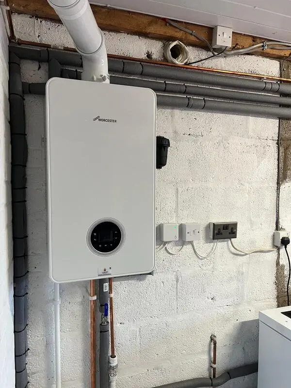 Worcester Bosch Greenstar boiler installation in garage with insulated pipework