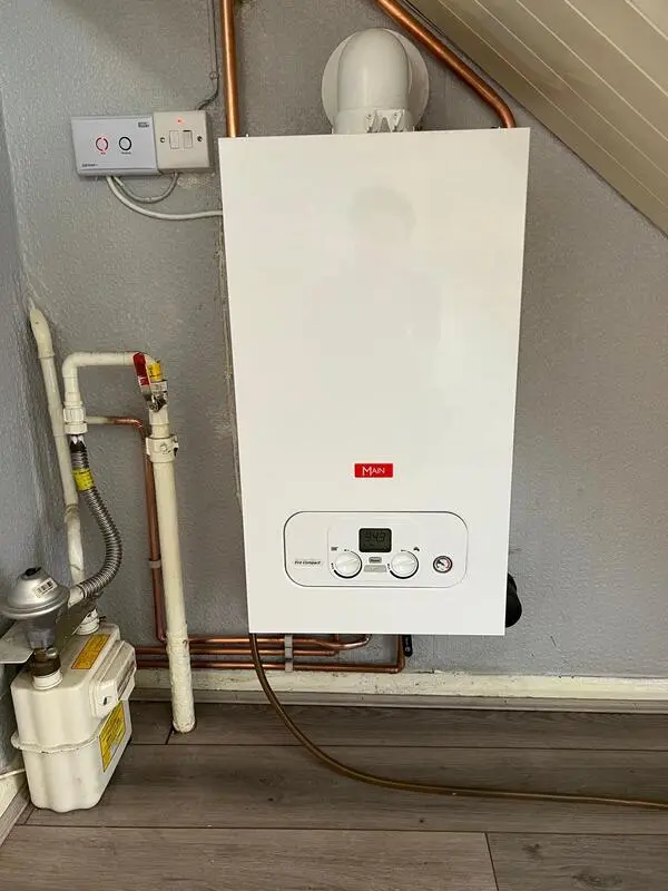 Professional boiler flue installation by gas engineer